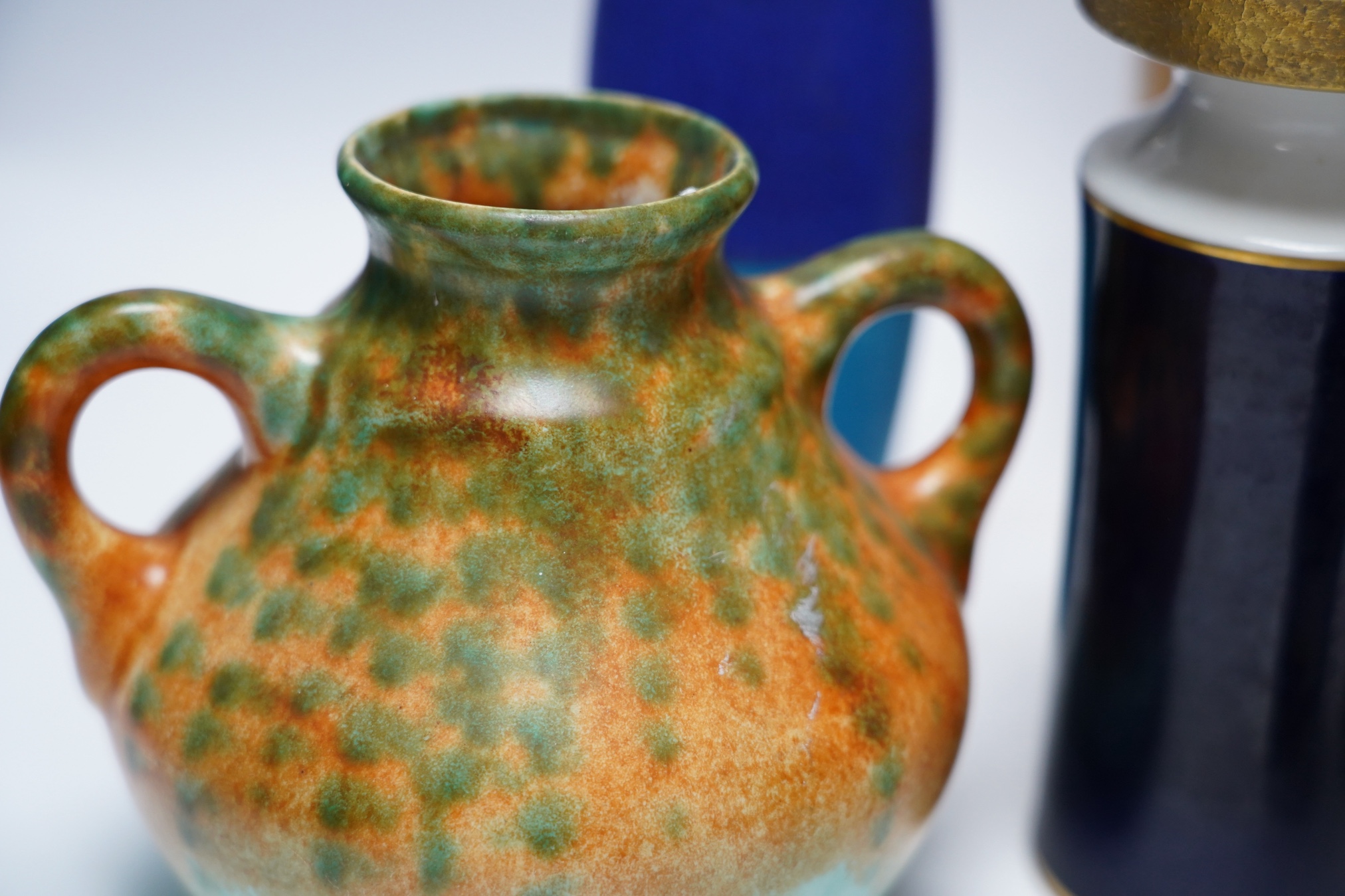 A Rye Pottery figure of Chaucer's Wife of Bath, five various pottery vases and a pottery bear, tallest 27cm high